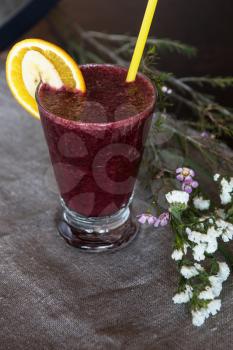 Fresh fruit smoothie from blueberry banana and orange juice