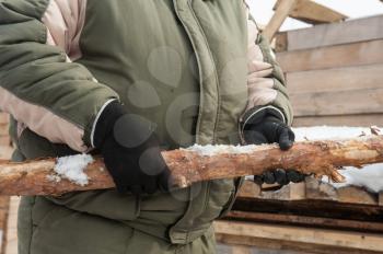 Carpenter working at sawmill, closeup photo
