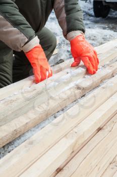 Carpenter working at sawmill, closeup photo