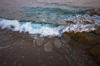 Blue sea with waves in the evening