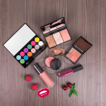 summer cosmetics set for make-up on wood background