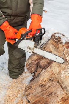 Carpenter working at sawmill, closeup photo