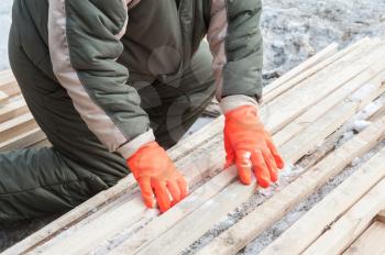 Carpenter working at sawmill, closeup photo