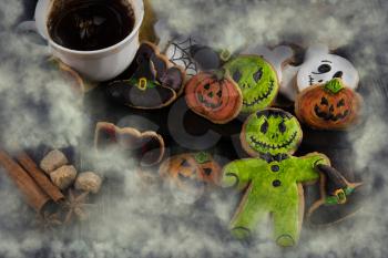 Homemade delicious ginger biscuits for Halloween on wooden table