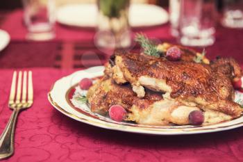 Roasted chicken with vegetables. Thanksgiving or christmas theme.