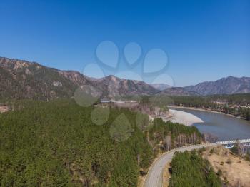 Aerial view of a road in summer landscape, in Altai mountains,