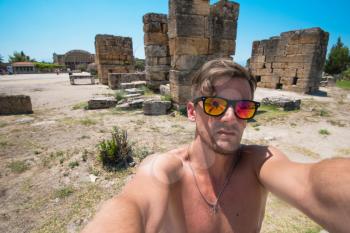 Selfie photo near of ancient city Hierapolis, Turkey