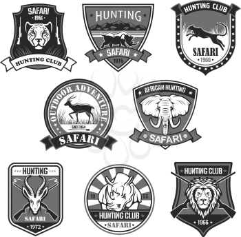 African safari animal hunting club and outdoor adventure badge set. African elephant, lion, rhino, antelope, panther, leopard with rifle and savanna landscape on heraldic shield with ribbon banner