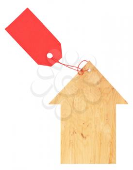 Wooden house with a red price tag
