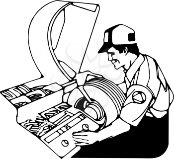 Royalty Free Clipart Image of a Mechanic Balancing Tires