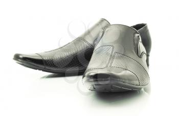 Black Men's patent-leather shoes isolated over white background