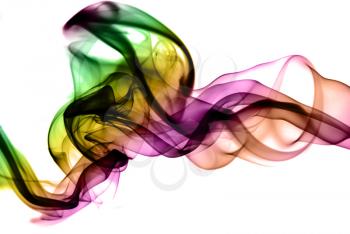 Bright colored magic smoke shapes over the white background