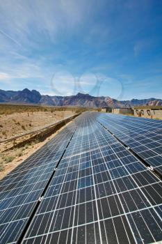 View of solar panels in the Mojave Desert.