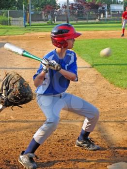 STATEN ISLAND, NY - JUNE 25, 2009: Anton Orlov, Staten Island resident, age 13, hits a ball during South Shore Babe Ruth League game on June 25, 2009 in Staten Island, NY.