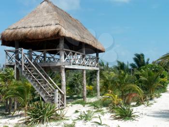A view of the hut built on the caribbean beach.