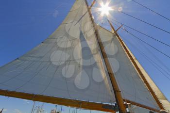 Views of the mast, sails and rigging on the private sail yacht.