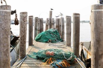 Detail of commercial fishing boat equipment at the dock.