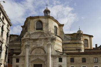 Venice, Italy - April 1, 2013: Street views of ancient architecture in Venice, Italy. Venice is a city in northeastern Italy sited on a group of 118 small islands separated by canals and linked by bri