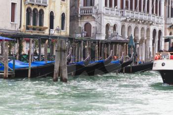 Venice, Italy - April 1, 2013: Street views of canals and ancient architecture in Venice, Italy. Venice is a city in northeastern Italy sited on a group of 118 small islands separated by canals and li