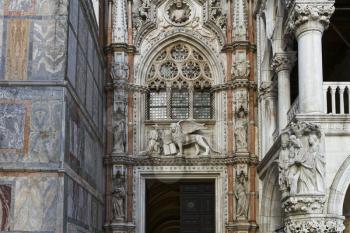 Venice, Italy - April 1, 2013: Street views of ancient architecture in Venice, Italy. Venice is a city in northeastern Italy sited on a group of 118 small islands separated by canals and linked by bri