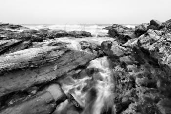 View of the rugged ocean rocky shore.