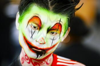 Jackson, USA-September 24, 2016: Street performer in Halloween costume and makeup is entertaining crowds.