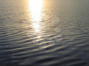 sunset reflected on water background