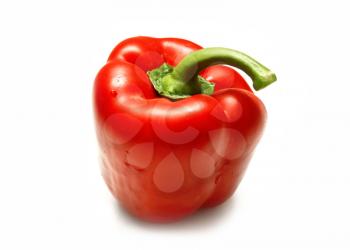red sweet pepper with water drops on a white background