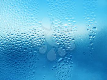 texture of natural water drops on glass
