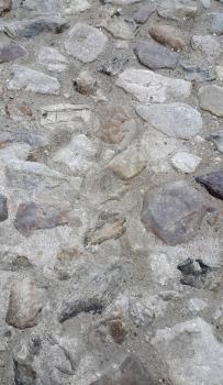 Texture of road surface paved with rough stones