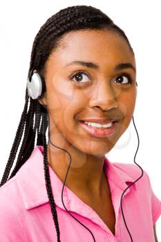 Royalty Free Photo of a Teenage Girl Listening to Music with Headphones