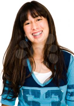 Royalty Free Photo of a Young Girl with Braces Smiling