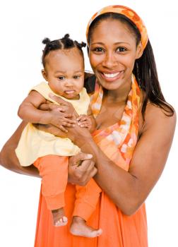 Royalty Free Photo of a Woman Holding her Baby