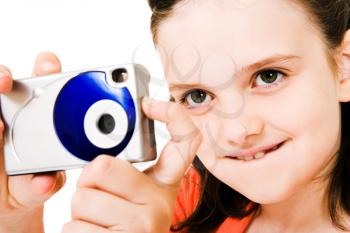 Royalty Free Photo of a Young Girl Posing with a Camera