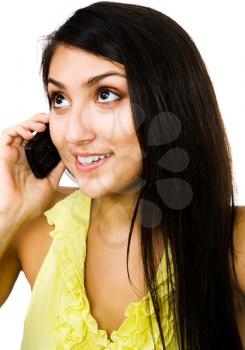 Royalty Free Photo of a Female Fashion Model Talking on a Cell Phone