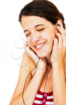 Royalty Free Photo of a Lady Enjoying Music Through her Earbuds