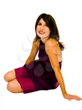 Royalty Free Photo of a Woman Sitting on the Floor Posing