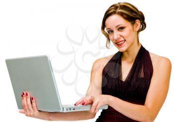 Royalty Free Photo of a Young Woman Holding a Laptop