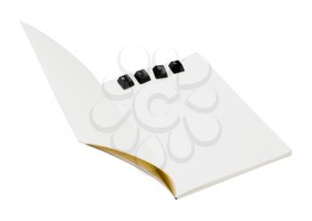 Royalty Free Photo of a Notebook with Computer Keys 