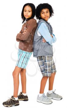 Royalty Free Photo of Two Young Girls Standing Back to Back