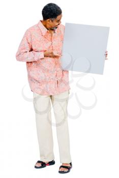 Royalty Free Photo of a Man Presenting a Blank Placard