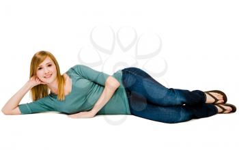 Royalty Free Photo of a Young Lady Lying on the Floor Posing