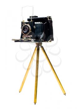 Black camera on a tripod isolated over white