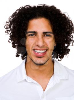 Handsome man smiling and posing isolated over white