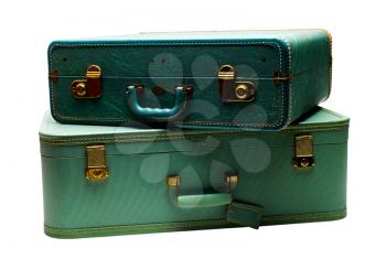 Green suitcases isolated over white