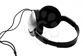 Black color headphones isolated over white