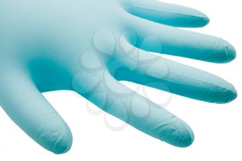 Close-up of a surgical glove isolated over white
