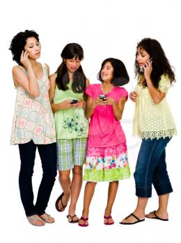 Family using mobile phones and smiling isolated over white