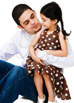 Close-up of a man hugging a girl isolated over white