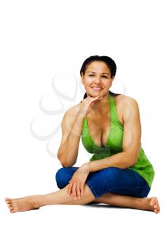 Woman sitting and smiling isolated over white
